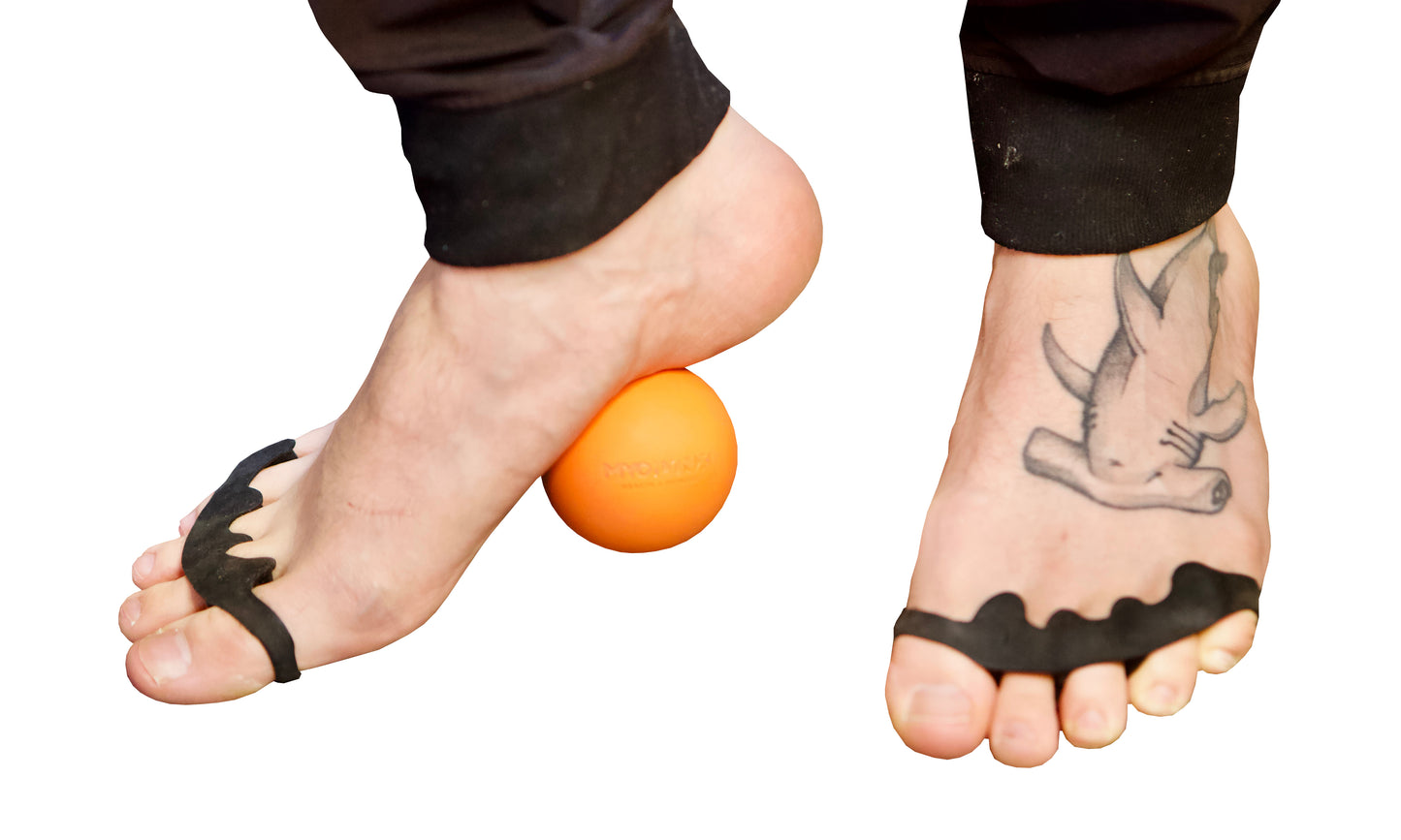 Man using toe spacers toe separators and massage ball to mobilize feet